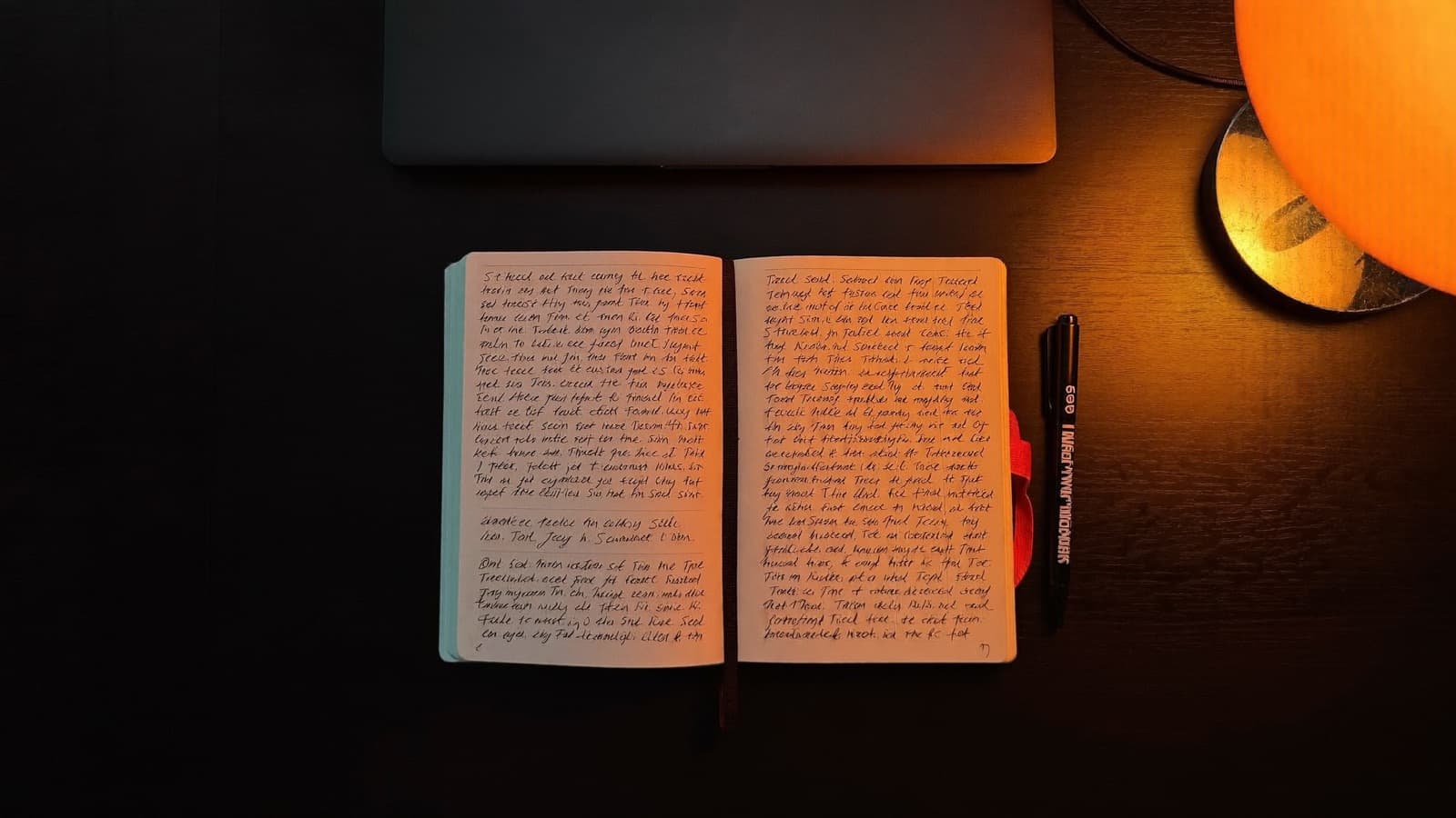 Neatly organized desk with structured notes under a warm lamp